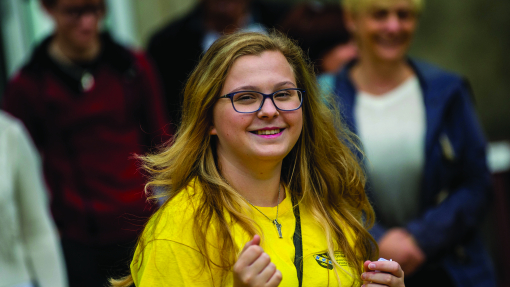 Student ambassador smiling at an open day