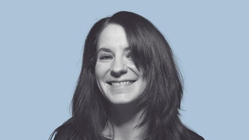 Agnes Olah smiles towards the camera.