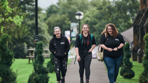 Girls walking on campus