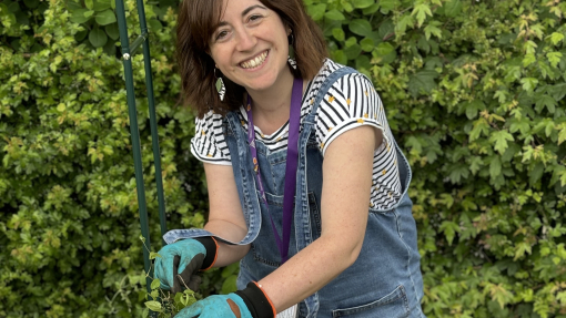 Image of Katrina Peters gardening with pupils