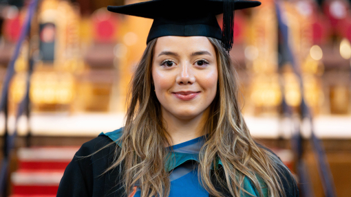 image of Molly Evans in her cap and gown
