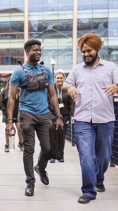 Students crossing bridge in Birmingham city centre