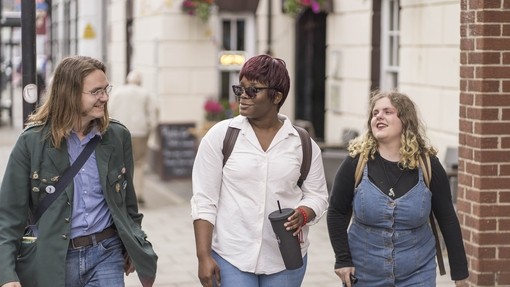 Students walking through Lampeter town