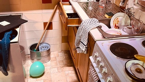 The dirty kitchen with a lovely fake egg.