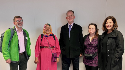Professor Gary Bunt with his colleagues inside the European Commission building