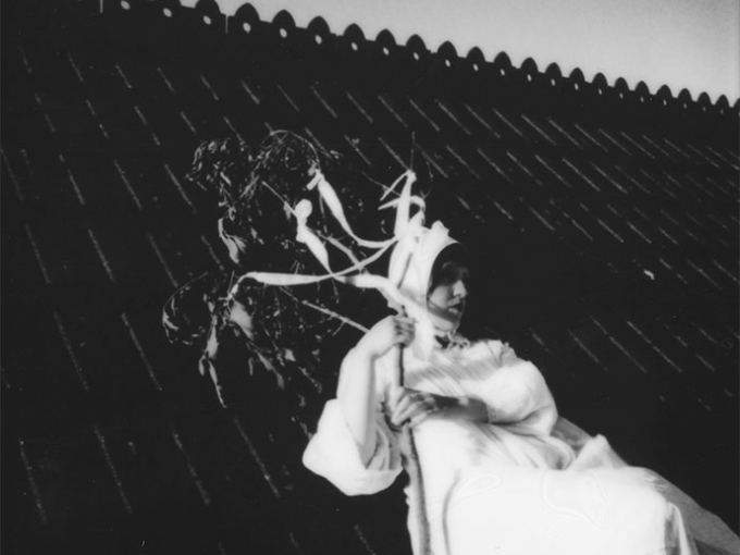 image of a woman next to a roof
