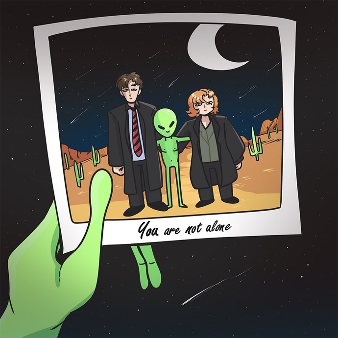 Digital art showing a green hand holding a cartoon polaroid; in the polaroid a little green alien stands smiling between two humans in a New-Mexico-style desert landscape.   