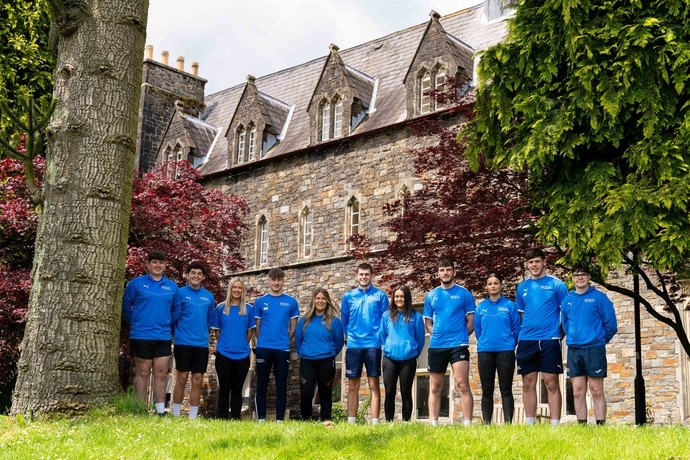 Members of the Academy of Sport line up on campus