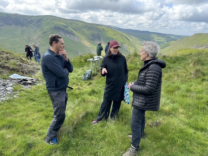 Johan Ling, Lene Melheim (Oslo) and Alan Williams on mountain discussing Early Bronze Age finds at Cwmystwyth ancient mine site 6/6/24)
