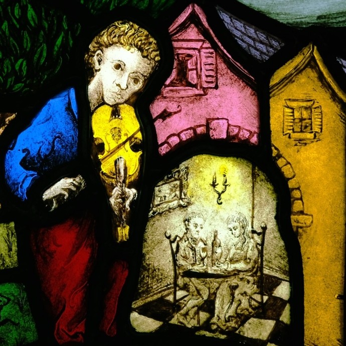 Bright stained glass image of man playing the fiddle. 