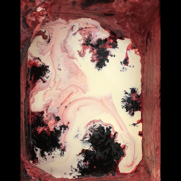 Abstract painting showing a pool of white like liquid plastic tainted by dark splotches like blood clots. 