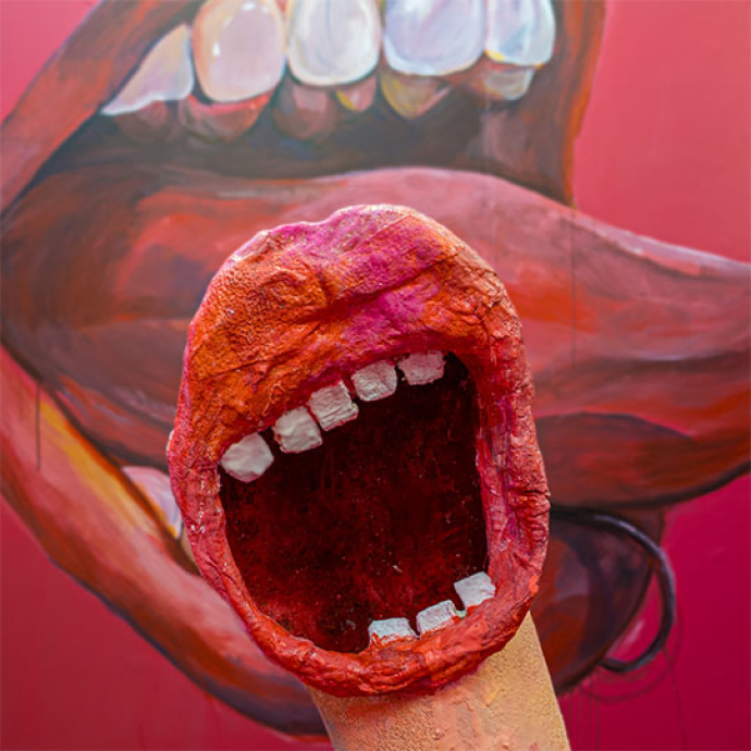 art and design of a mouth with teeth and a tongue